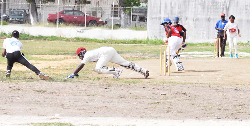 Anthony Antonio is caught at slip by Kennard Moonsammy off Daniel Persaud who took 5-14 in a losing cause for Saints Stanislaus College at TSC ground yesterday.