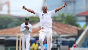 Chris Barnwell roars after taking his fifth wicket, T&T v Guyana, Regional Four-Day Tournament, 1st day, Port-of-Spain, December 4, 2015 © WICB Media/Ashley Allen