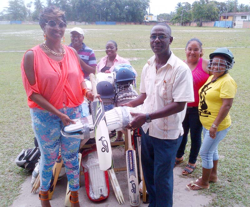 Representatives of the GUSDA donate the cricket gears to the Linden clubs.