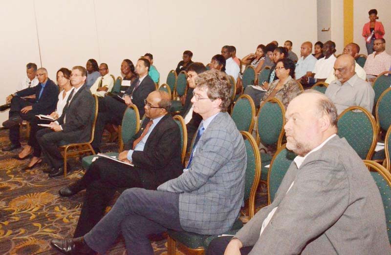 From left: US Ambassador to Guyana, Mr. Perry Holloway, British High Commissioner to Guyana, Mr. Greg Quinn, Indian High Commissioner to Guyana, Mr. Venkatachalam Mahalingam and members of the GCCI at the AGM. (Ministry of the Presidency photos)