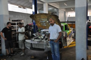  (Flashback)- Group 4 racer Irfaan Kalamadeen (right) poses next to his Mazda RX 7 machine at the team’s garage.