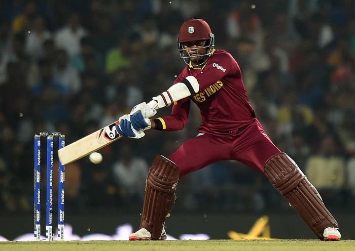 Marlon Samuels reaches out to play one, South Africa v West Indies, World T20 2016, Group 1, Nagpur, March 25, 2016 ©AFP