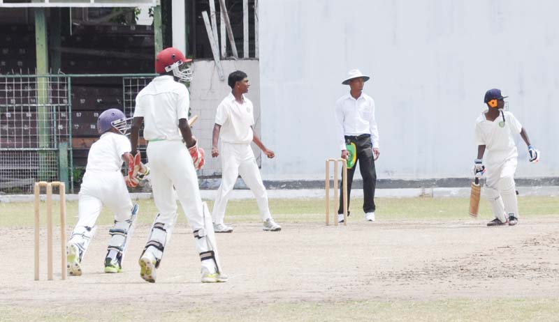 National U-15 batsman Orlando Jailall is about to be caught off fellow Guyana youth spinner Kelvin Omroa.