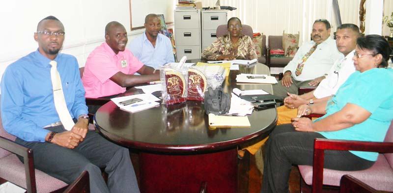 Officials of the GCB meet with Director of Sport Christopher Jones (left foreground), Minister Nicolette Henry (centre) and PS Alfred King (3rd left).