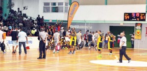 Linden’s Retrieve Raiders (grey and white) leave the Cliff Anderson Sports Hall with 9:18 left on the game clock and Colts leading 54-51, returning on the insistence of President of Guyana’s Amateur Basketball Federation, Nigel Hinds.