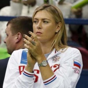  Russia’s Maria Sharapova reacts as she watches compatriot Ekaterina Makarova play against Kiki Bertens of the Netherlands during their Fed Cup World Group tennis match in Moscow, February 6, 2016. (Reuters/Grigory Dukor)