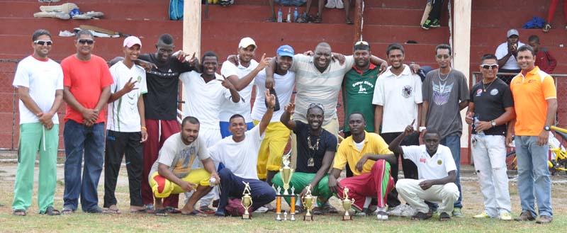 Members of the victorious Sans Souci team with officials of the WCC and sponsors.