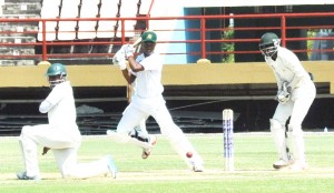 Shimron Hetymer cuts for four during his maiden First-Class century at Providence yesterday.
