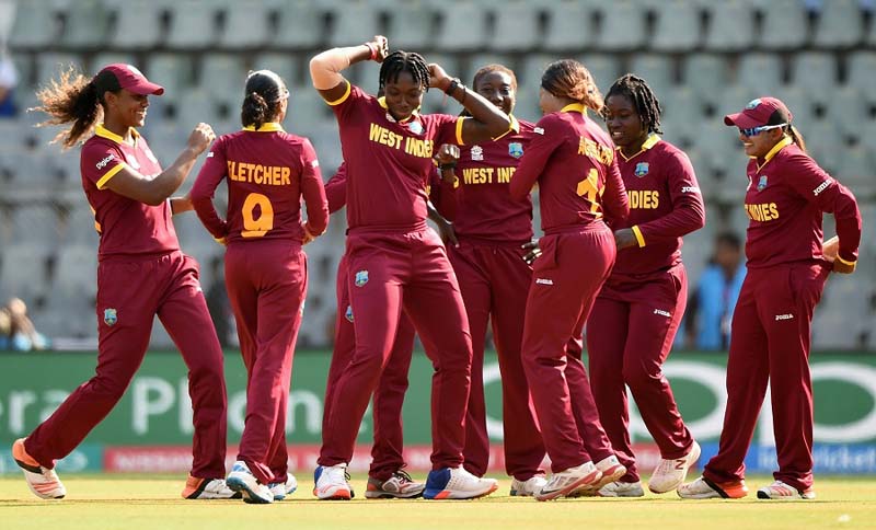 The West Indies team is a gleeful bunch after picking up an early wicket, New Zealand v West Indies, Women’s World T20, semi-final, Mumbai, March 31, 2016 ©AFP