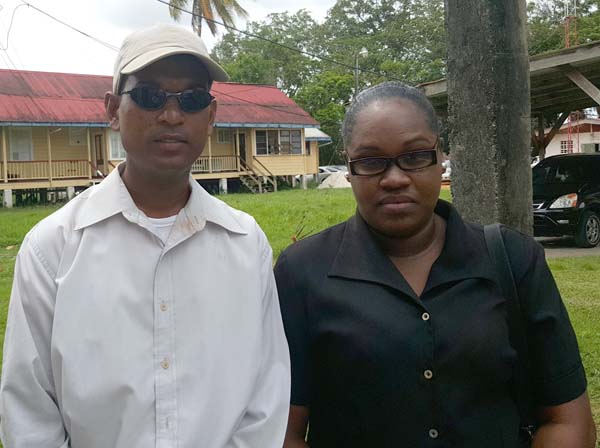 Case dismissed: Police Constables Devin Singh (left) and Rosel Tilbury-Douglas yesterday at the Providence Magistrate’s Court.