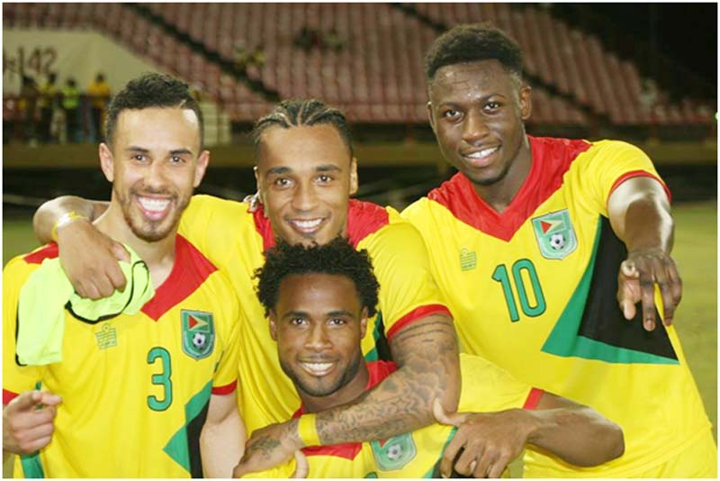 Sam Cox (left) celebrates with fellow Golden Jags after their 7-0 win over Anguilla.