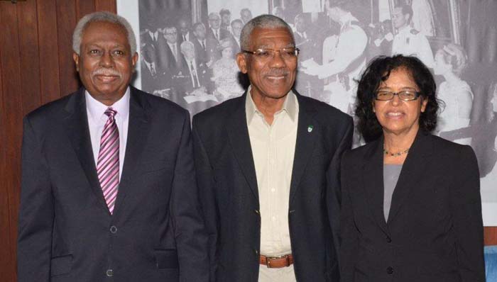 President David Granger (centre) is flanked by Mr. Hamley Case and Ms. Clarissa Riehl