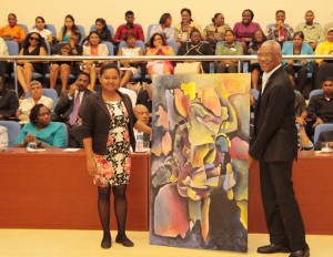 It wasn’t only the women who were awarded yesterday, as President Granger was also the recipient of a painting from a representative of the Women’s Association for Sustainable Development.