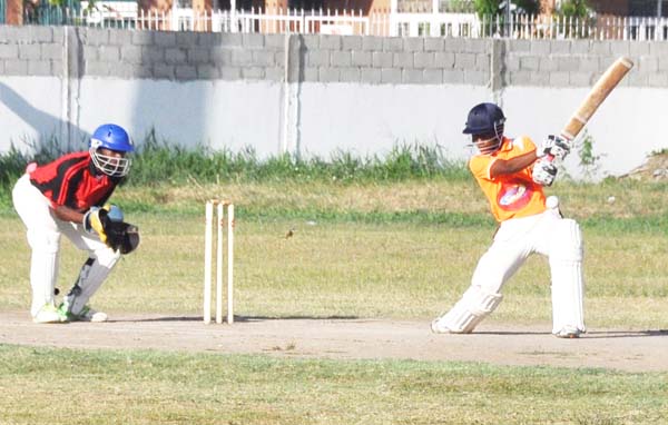 Alphius Bookie cuts during his unbeaten 42 at DCC yesterday.