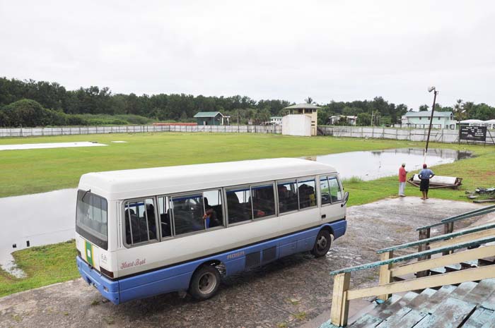 The Berbice team Bus about to depart the flooded Wales ground yesterday.