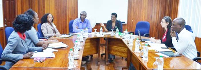 From left to right: Staff of the Central Planning and Housing Authority, Chief  Development Planner, Rawle Edinboro (fourth from left), Permanent Secretary of Ministry of Business, Rajdai Jagarnauth (fifth from  left) and the World Bank’s team, Consultant Jessica Victor      (second from right) and Information Technology Analyst, Ayodele Browne ( first from right)
