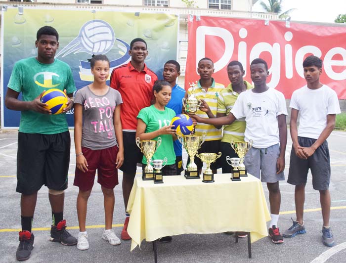 Winners of the Georgetown Zone of the Demerara Volleyball Association school league, St. Rose’s High School pose with the Indesco trophy.