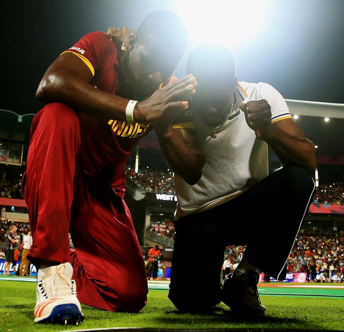 Darren Sammy and Andre Fletcher pray, England v West Indies, World T20, final, Kolkata, April 3, 2016 ©AFP