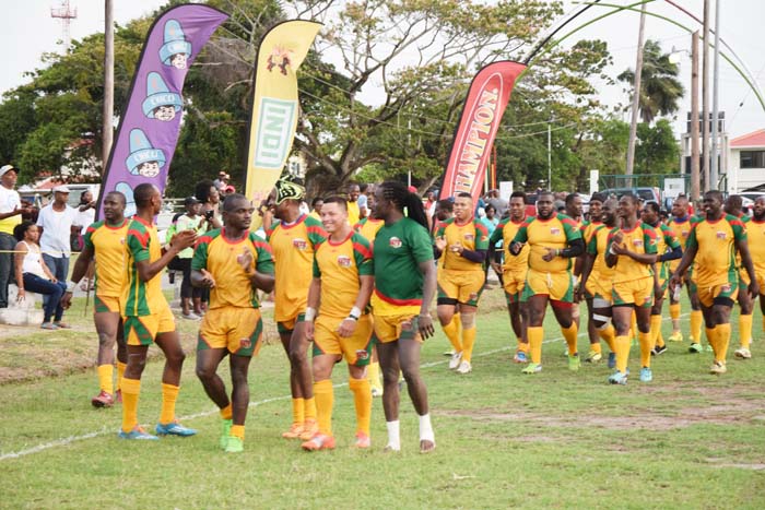 The national rugby team acknowledges the fans during a lap of honour last Saturday following their win against Barbados.