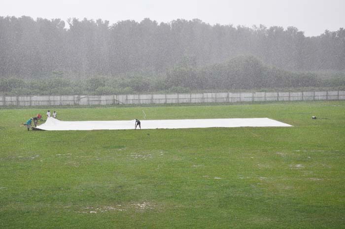 Heavy mid-day showers at Wales prevented any prospects of play yesterday.