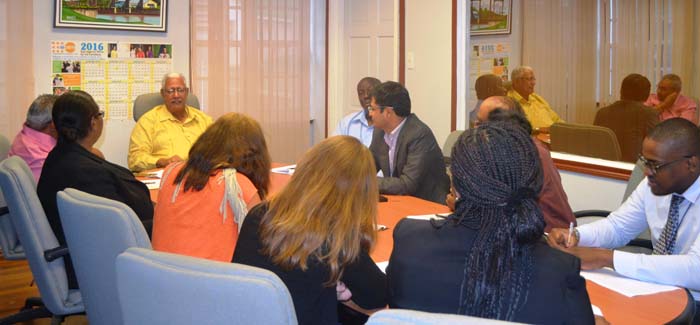 Minister Noel Holder during his meeting with the team from IDB. (A MOA Photo)