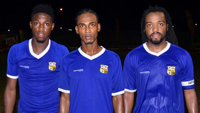 Pele’s Gregory Richardson is flanked by teammates Konata Mannings (right) and Colric Beckles.