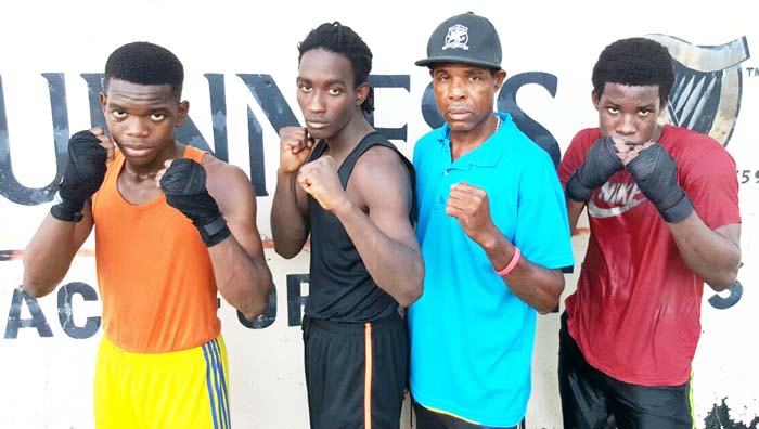 The St Lucian boxing team that will arrive this evening for their challenge at the Schoolboys and Junior tournament at the Sports Hall Friday and Saturday. Coach Conrad Hunte is second right. 