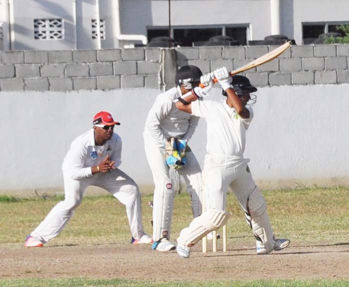 Vishaul Singh back cuts for four during his 74 for at DCC yesterday.