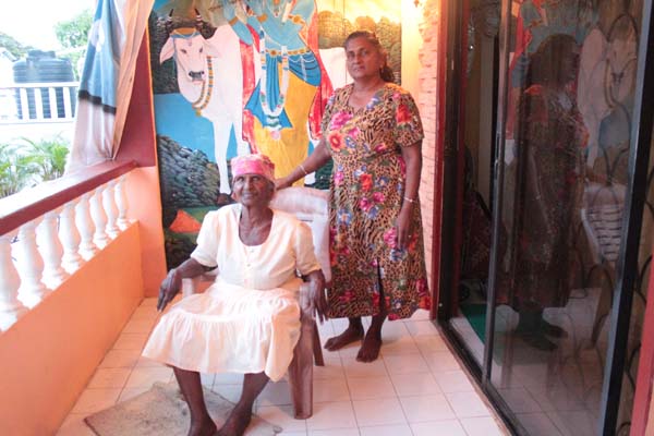 Aunty Chalma and her daughter, Golin at her home in Leonora yesterday. 