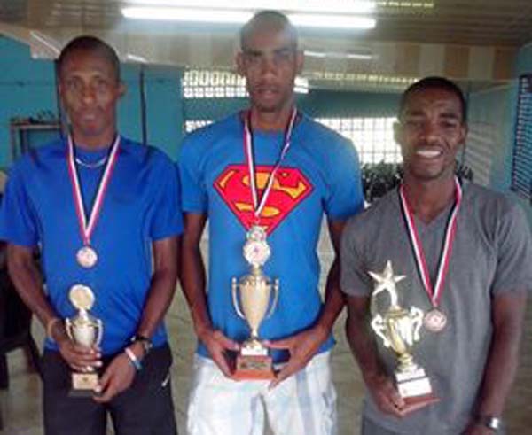 Guyanese, Lionel D’Andrade (centre) and Kelvin Johnson (right) following the Point Fortin Race on Sunday with winner, Trinidadian Curtis Cox.