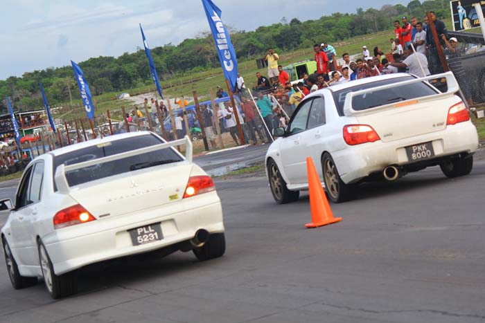 Two cars seen at the starting line in a previous Drag Meet.
