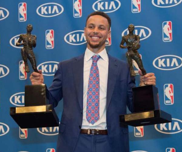 Golden State Warriors guard Stephen Curry with the 2014-2015 & 2015-2016 NBA Most Valuable Player trophies at Oracle Arena. (Kyle Terada-USA TODAY Sports)