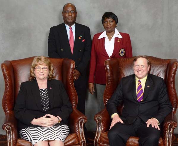 Dr and Mrs Cummings with the International President Fiscal Year (2014-2015) Joe Preston and his wife.