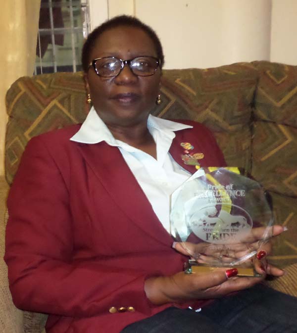 Displaying an award she received as District Governor.