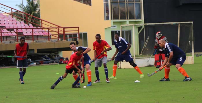 National U-21 player Meshach Sargeant attempts to weave his way into the GCC goal area during a practice game at the Guyana National Stadium.