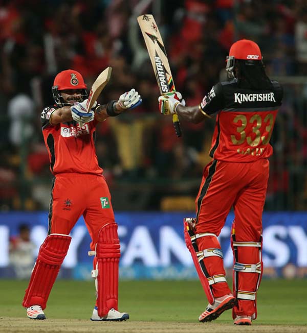 Virat Kohli and Chris Gayle celebrate the latter’s fifty with the champion dance, Royal Challengers Bangalore v Kings XI Punjab, IPL 2016, Bangalore, May 18, 2016 ©BCCI