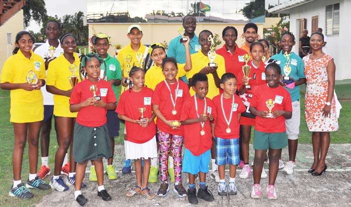 Winners in the Sheltez Tennis Club Homesafe Security Junior tournament show off the trophies and medals.