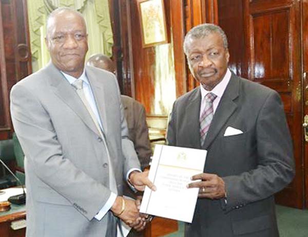 Minister of State Joseph Harmon presented a copy of the report to Speaker of the National Assembly Dr. Barton Scotland.
