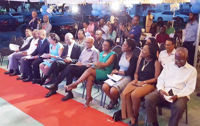 Third from left: CEO of EML William Andrew Boyle, First Lady Sandra Granger, President David Granger, Dr. David Singh and Dr. Karen Boyle seated with guests at the launch.