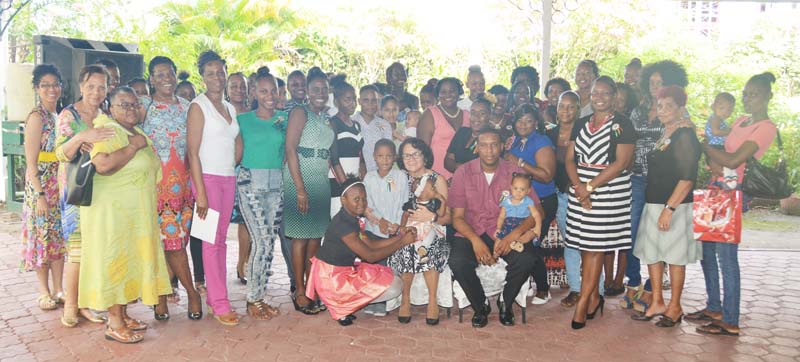 First Lady, Mrs. Sandra Granger, donors, volunteers and beneficiaries of the Women Across Differences programme for adolescent mothers at the Georgetown Club.