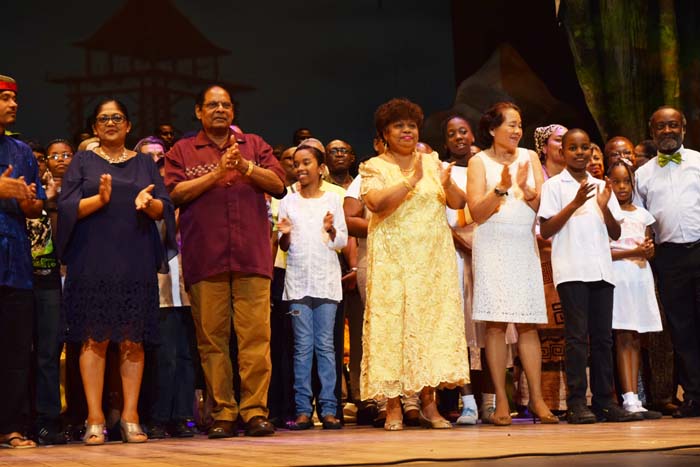 Prime Minister Moses Nagamootoo and First Lady Mrs. Sandra Granger with the performers of “One”.