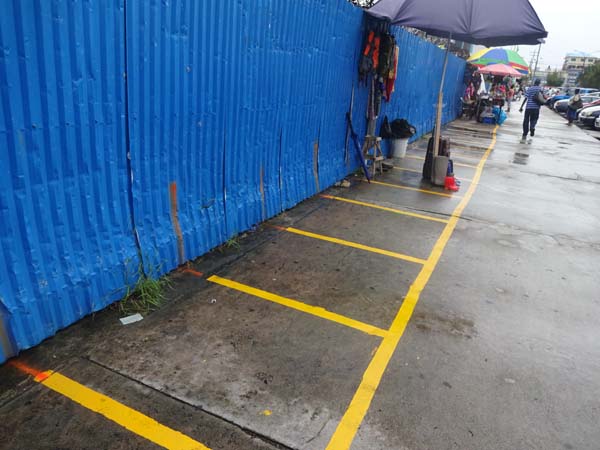  The areas for vending on the Water Street pavement outlined in yellow paint.