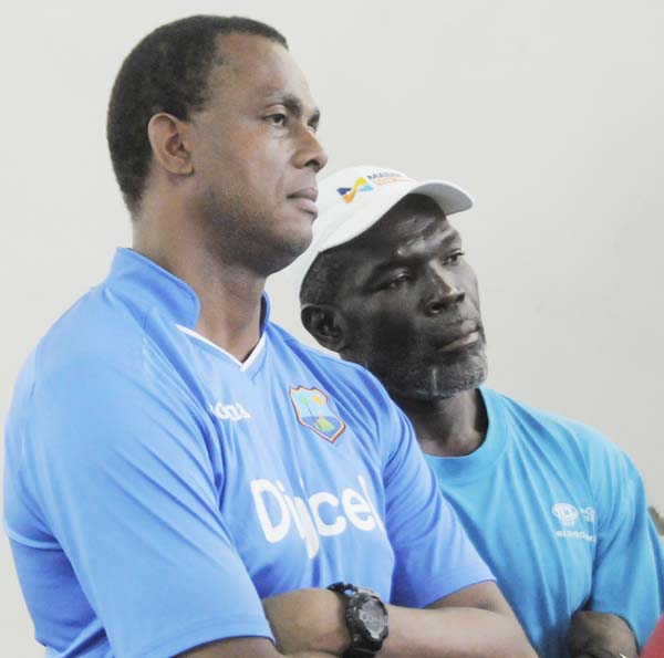 Former West Indies fast bowlers Courtney Walsh and Winston Benjamin during yesterday’s session. WICB Media/Randy Brooks