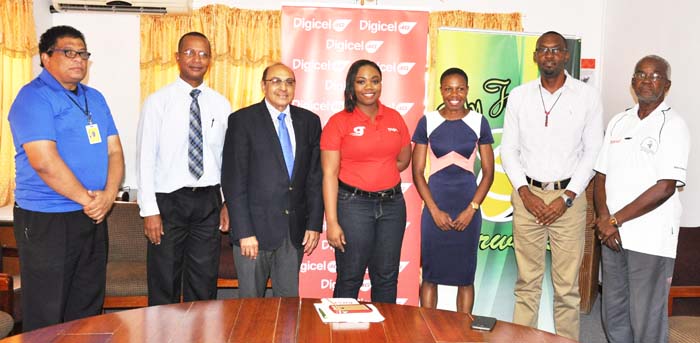 Aliann Pompey (third, left) with stakeholders after the launch of the AP Invitational yesterday at the Guyana Olympic Association (GOA) Headquarters. 