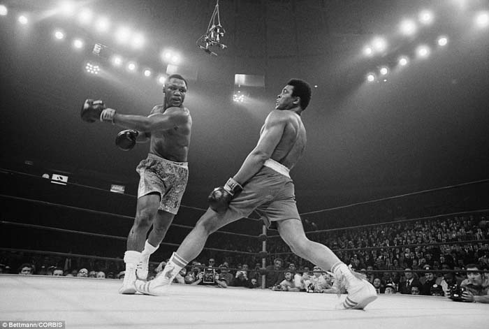 Ali dodges a Frazier punch during this fight in 1971. Frazier won this time but Ali came out on top in 1974 and 75.