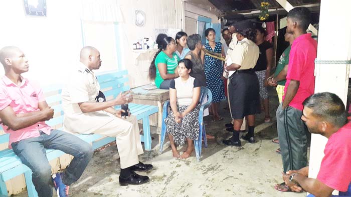 Commander Amsterdam and other members of the Cops and Faith at Dhanpaul Ramphal’s residence.  