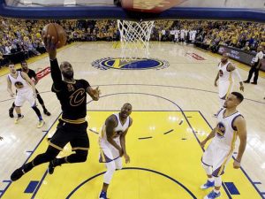 Cleveland Cavaliers forward LeBron James (23) shoots the ball against Golden State Warriors forward Andre Iguodala (9) in Game 5 of the NBA Finals at Oracle Arena.  (Pool Photo, USA TODAY Sports)