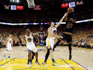 Cleveland Cavaliers guard Kyrie Irving (2) shoots the ball against Golden State Warriors guard Klay Thompson (11) during the fourth quarter in Game 5 of the NBA Finals at Oracle Arena.  (Bob Donnan, USA TODAY Sports)