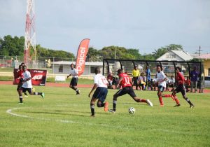 Part of the action in this year’s opening encounter of the Digicel Nationwide Schools Football Competition which was played at Leonora Synthetic Track facility.