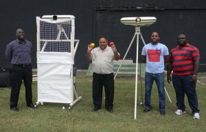 GCB officials pose with the newly acquired bowling machines.